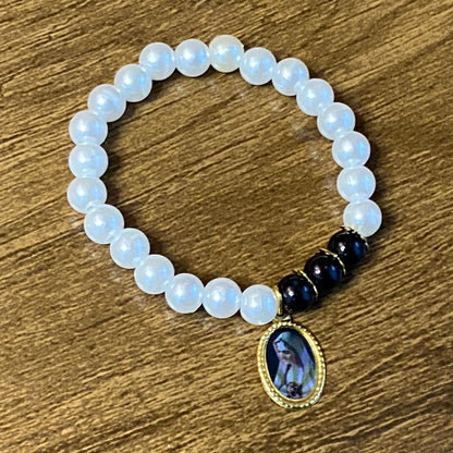 PULSEIRA PÉROLA NOSSA SENHORA DE FÁTIMA (01 UNIDADE)