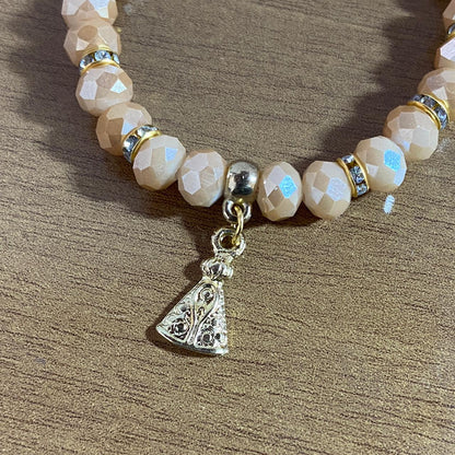PULSEIRA CRISTAL BEGE NOSSA SENHORA APARECIDA  (06 UNIDADES)