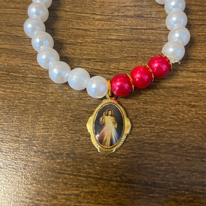 PULSEIRA PÉROLA JESUS MISERICORDIOSO  (01 UNIDADE)