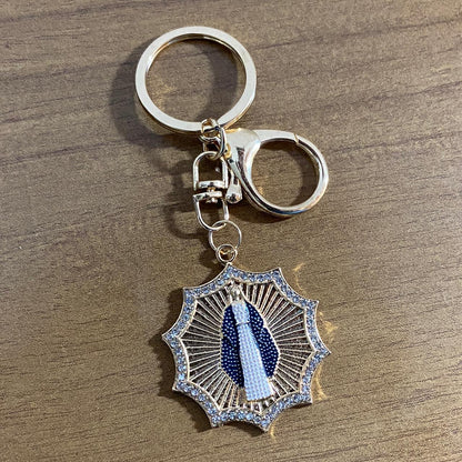 CHAVEIRO LUXO NOSSA SENHORA DAS GRAÇAS COM MOSQUETE MOD3 (6 UNIDADES)