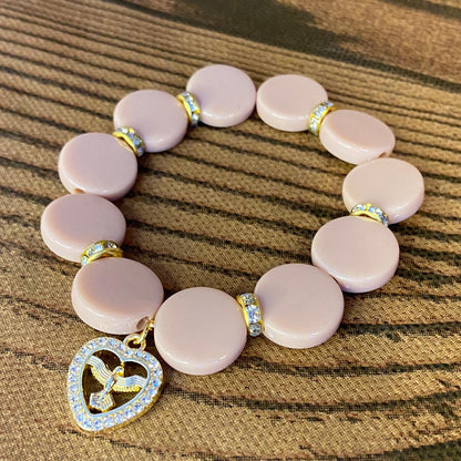 PULSEIRA ACRÍLICA ROSÉ COM MEDALHA DIVINO ESPÍRITO SANTO COM STRASS (03 UNIDADES)