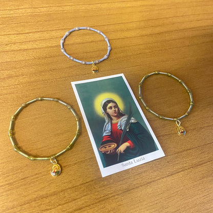 PULSEIRA DE MOLA COM MEDALHA SANTA LUZIA CORES SORTIDAS  (3 UNIDADES)