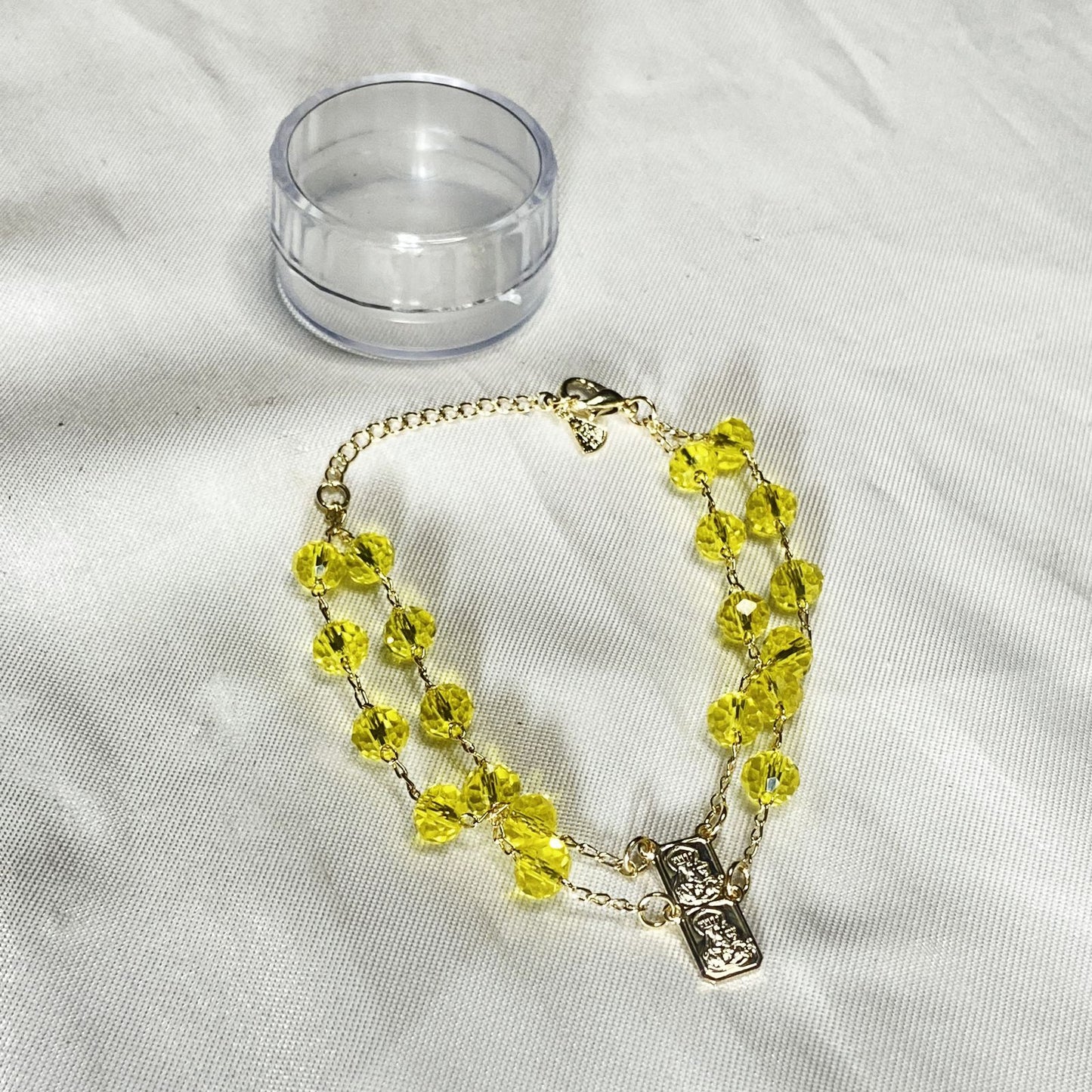 PULSEIRA ESCAPULARIO CRISTAL AMARELO TRANSPARENTE (3 UNIDADES)