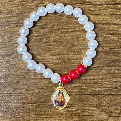 PULSEIRA PÉROLA SAGRADO CORAÇÃO DE JESUS   (01 UNIDADE)