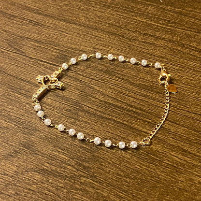 PULSEIRA DOURADA PÉROLA CRUZ COM STRASS  (3 UNIDADES)