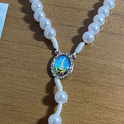 TERÇO PÉROLA BRANCA NOSSA SENHORA DE FÁTIMA 8MM (1 UNIDADE)