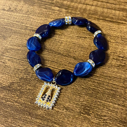 PULSEIRA PEDRARIAS COM PINGENTE NOSSA SENHORA APARECIDA COM STRASS (03 UNIDADES)