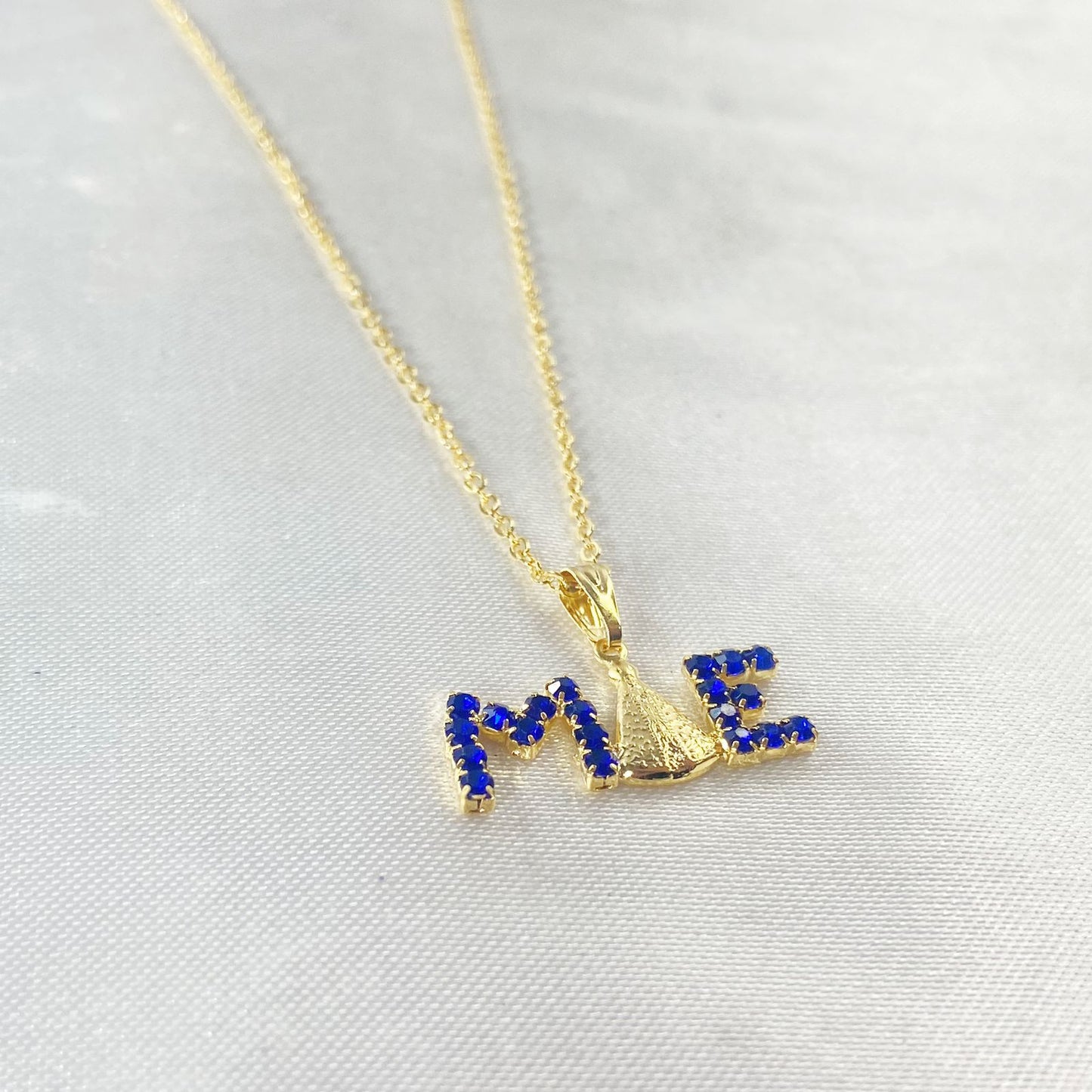 CORRENTE DOURADA MÃE COM STRASS AZUL