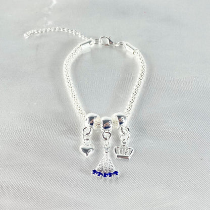 PULSEIRA NÍQUEL NOSSA SENHORA APARECIDA COM STRASS AZUL (6 UNIDADES)