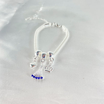 PULSEIRA NÍQUEL NOSSA SENHORA APARECIDA COM STRASS AZUL (6 UNIDADES)