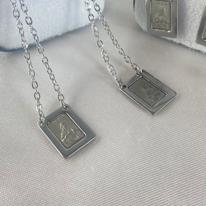 ESCAPULÁRIO INOX QUADRADO SAGRADO CORAÇÃO DE JESUS E NOSSA SENHORA DO CARMO MODELO 1 (6 UNIDADES)