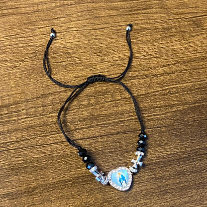 PULSEIRA REGULÁVEL CRISTAL PRETO COM MEDALHA RESINADA NOSSA SENHORA DAS GRAÇAS  ( 01 UNIDADE)
