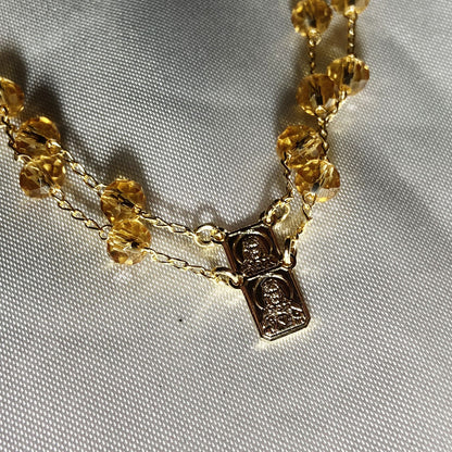 PULSEIRA ESCAPULARIO CRISTAL BEGE TRANSPARENTE (3 UNIDADES)