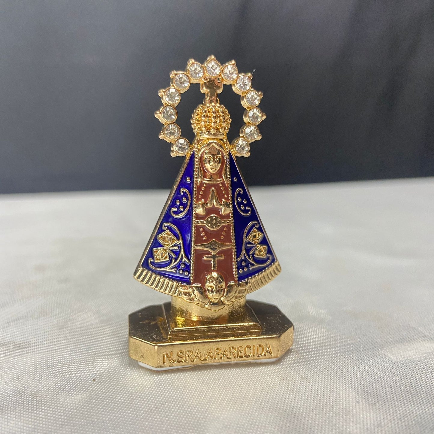 IMAGEM NOSSA SENHORA APARECIDA MARROM PARA CARRO COM STRASS (12 UNIDADES)