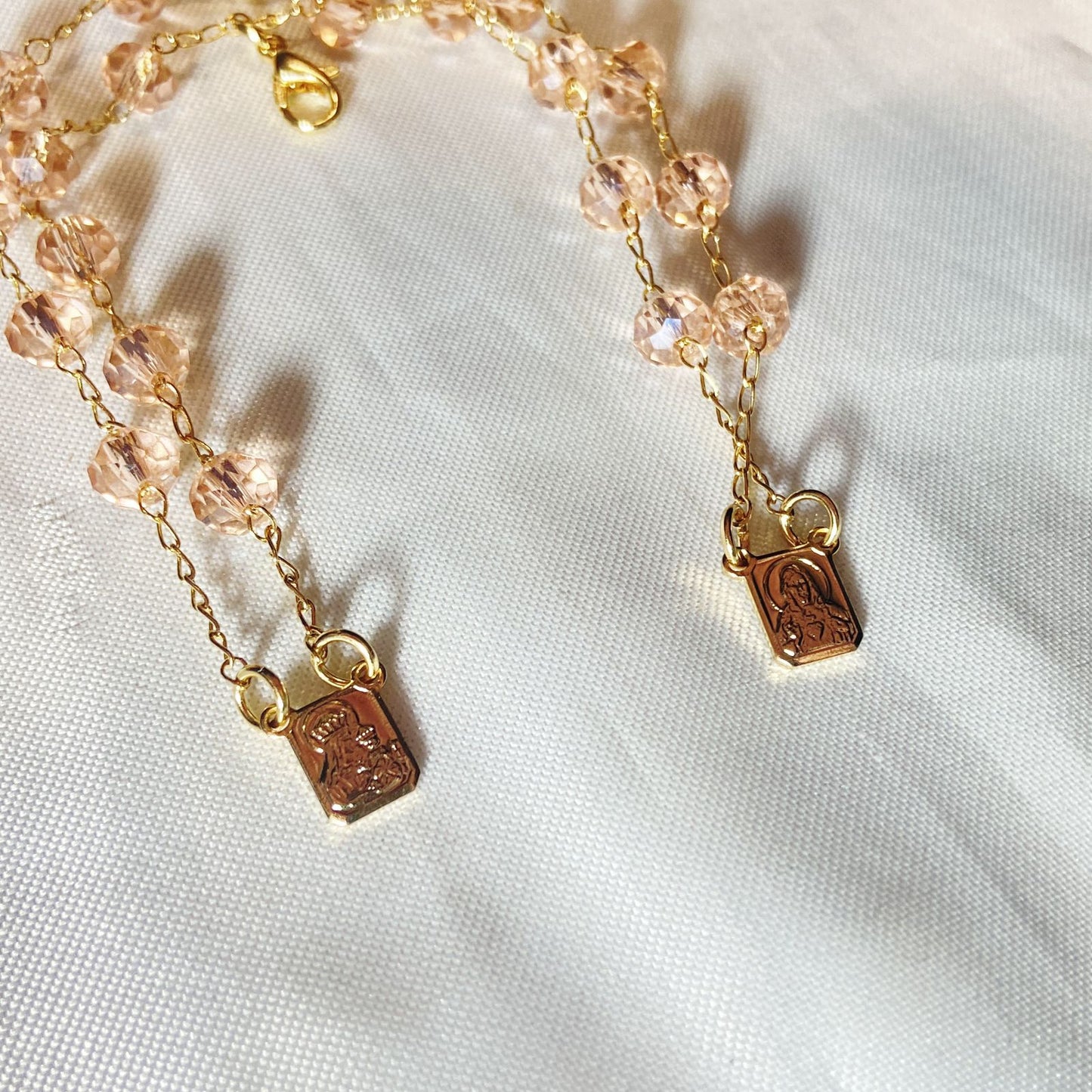 PULSEIRA ESCAPULARIO CRISTAL ROSA TRANSPARENTE (3 UNIDADES)