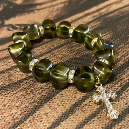 PULSEIRA PÉROLA MARROM EDOURADA COM PINGENTE DE CRUZ 10MM  (03 UNIDADES)