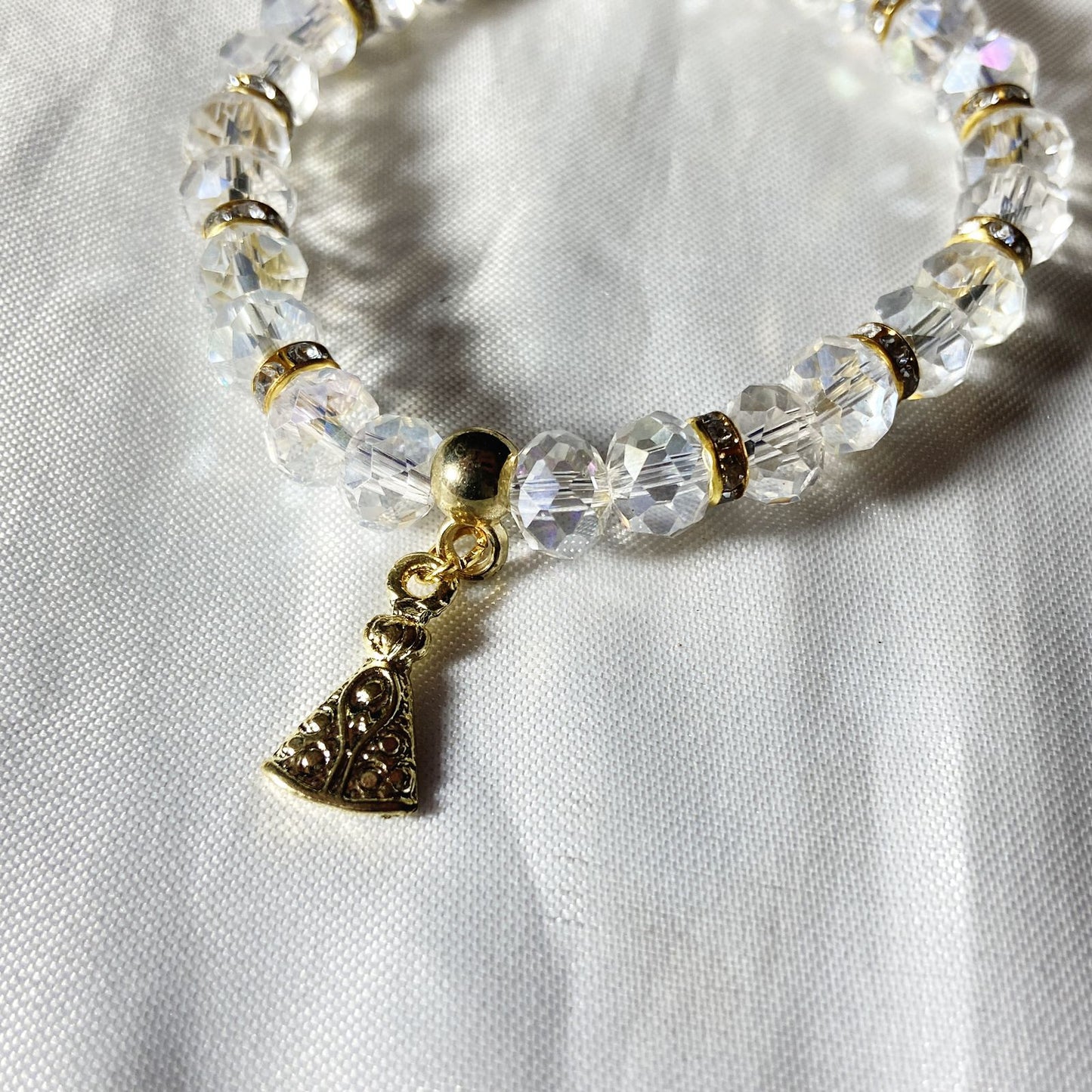 PULSEIRA CRISTAL TRANSPARENTE NOSSA SENHORA APARECIDA  (06 UNIDADES)