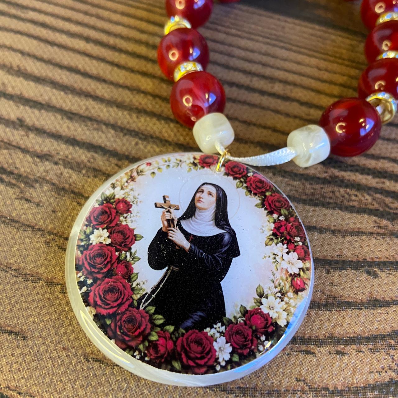 DEZENA PEDRARIAS MEDALHÃO RESINADO  SANTA RITA  12MM - MOD 2 (1 UNIDADE)