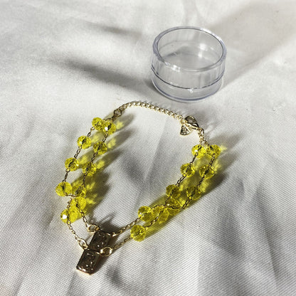 PULSEIRA ESCAPULARIO CRISTAL AMARELO TRANSPARENTE (3 UNIDADES)