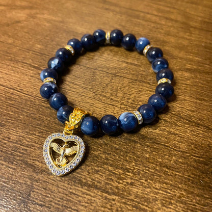 PULSEIRA PÉROLA AZUL COM PINGENTE DIVINO ESPÍRITO SANTO COM STRASS 08MM  (03 UNIDADES)