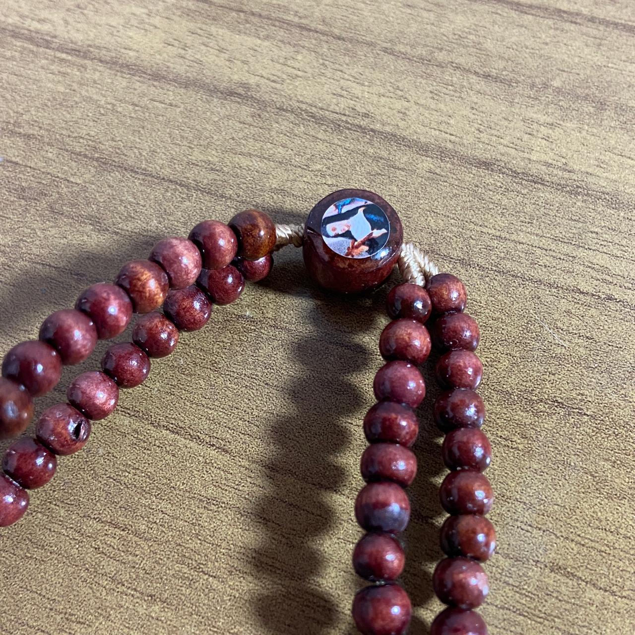 TERÇO PULSEIRA MADEIRA SANTA RITA  (12 UNIDADES)