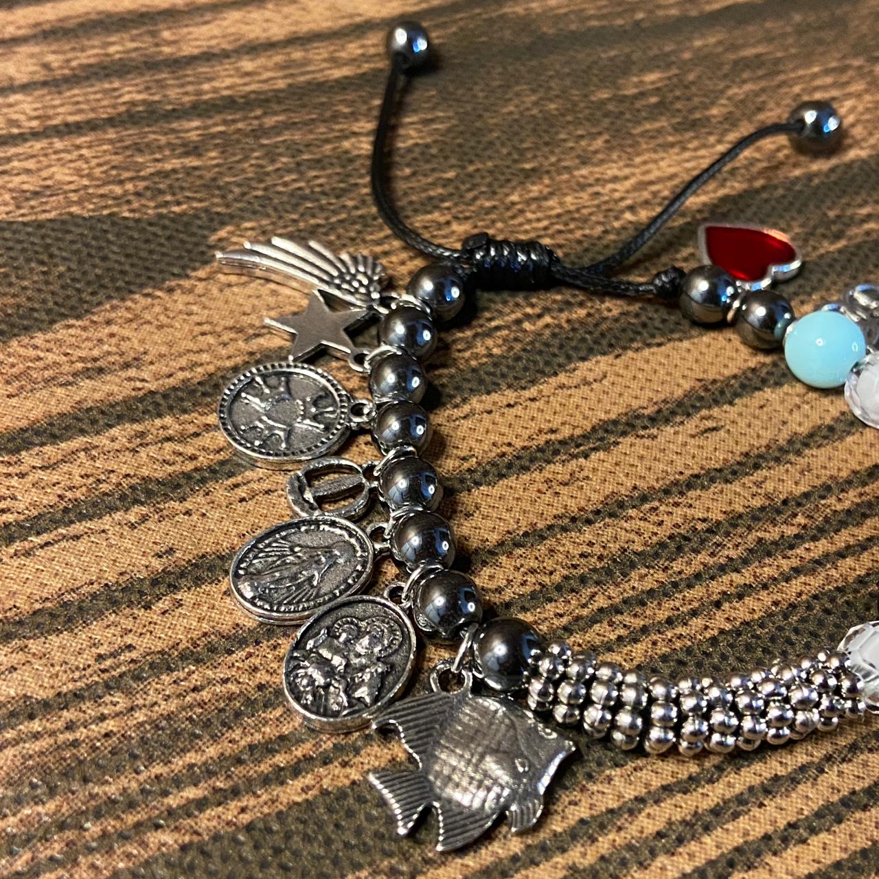PULSEIRA HEMATITA COM PÉROLA A GRANDE HISTÓRIA DE JESUS REGULÁVEL   ( 1 UNIDADE)