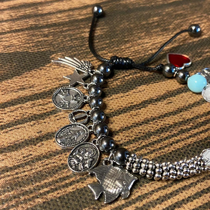 PULSEIRA HEMATITA COM PÉROLA A GRANDE HISTÓRIA DE JESUS REGULÁVEL   ( 1 UNIDADE)