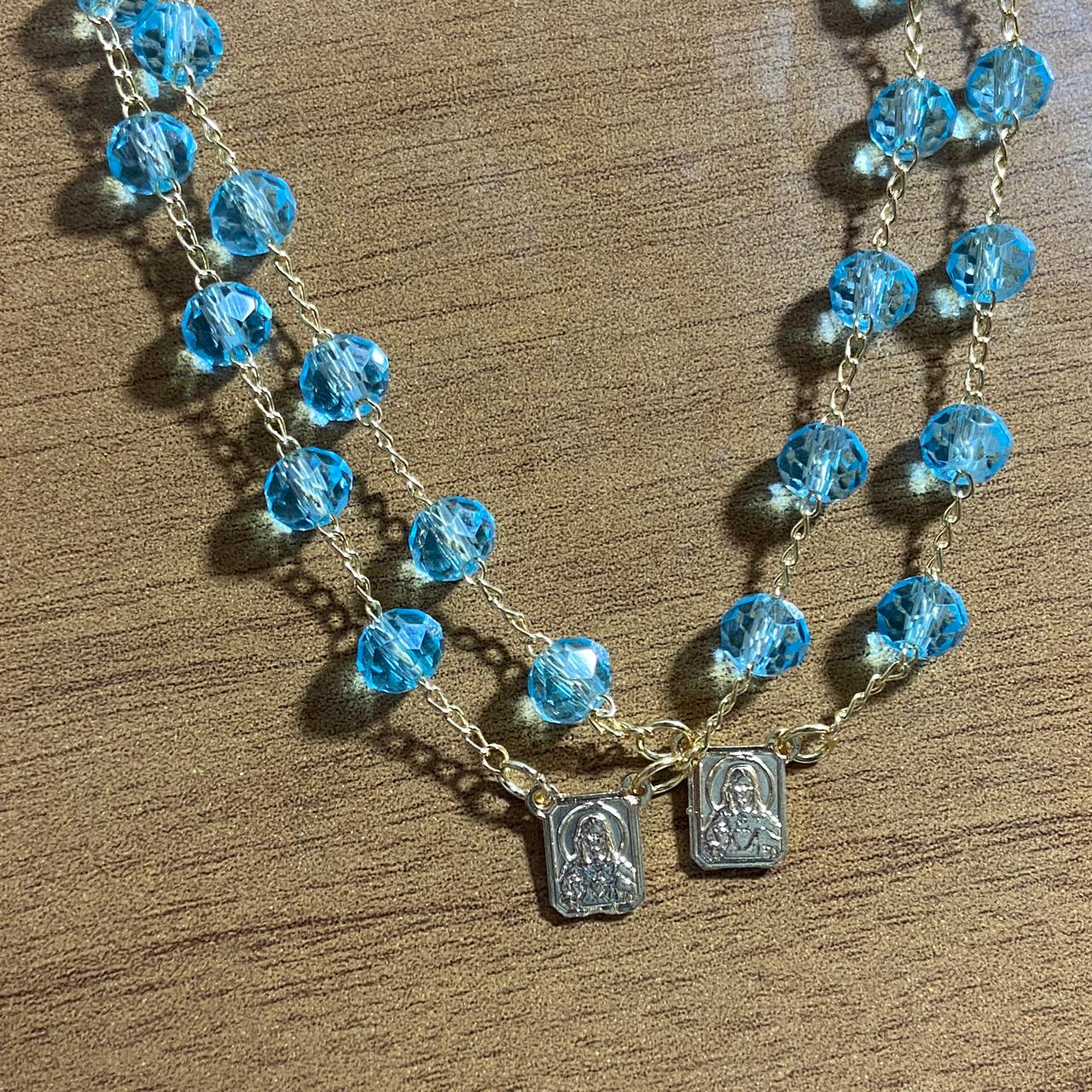 PULSEIRA ESCAPULARIO CRISTAL AZUL CLARO (3 UNIDADES)