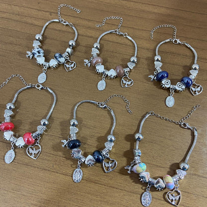 PULSEIRA PRATEADA NOSSA SENHORA DAS GRAÇAS COM BERLOQUES (6 UNIDADES)