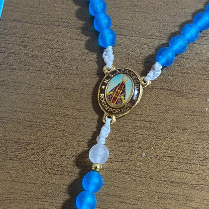 TERÇO PÉROLA AZUL NOSSA SENHORA APARECIDA 6MM MOD 2 (1 UNIDADE)