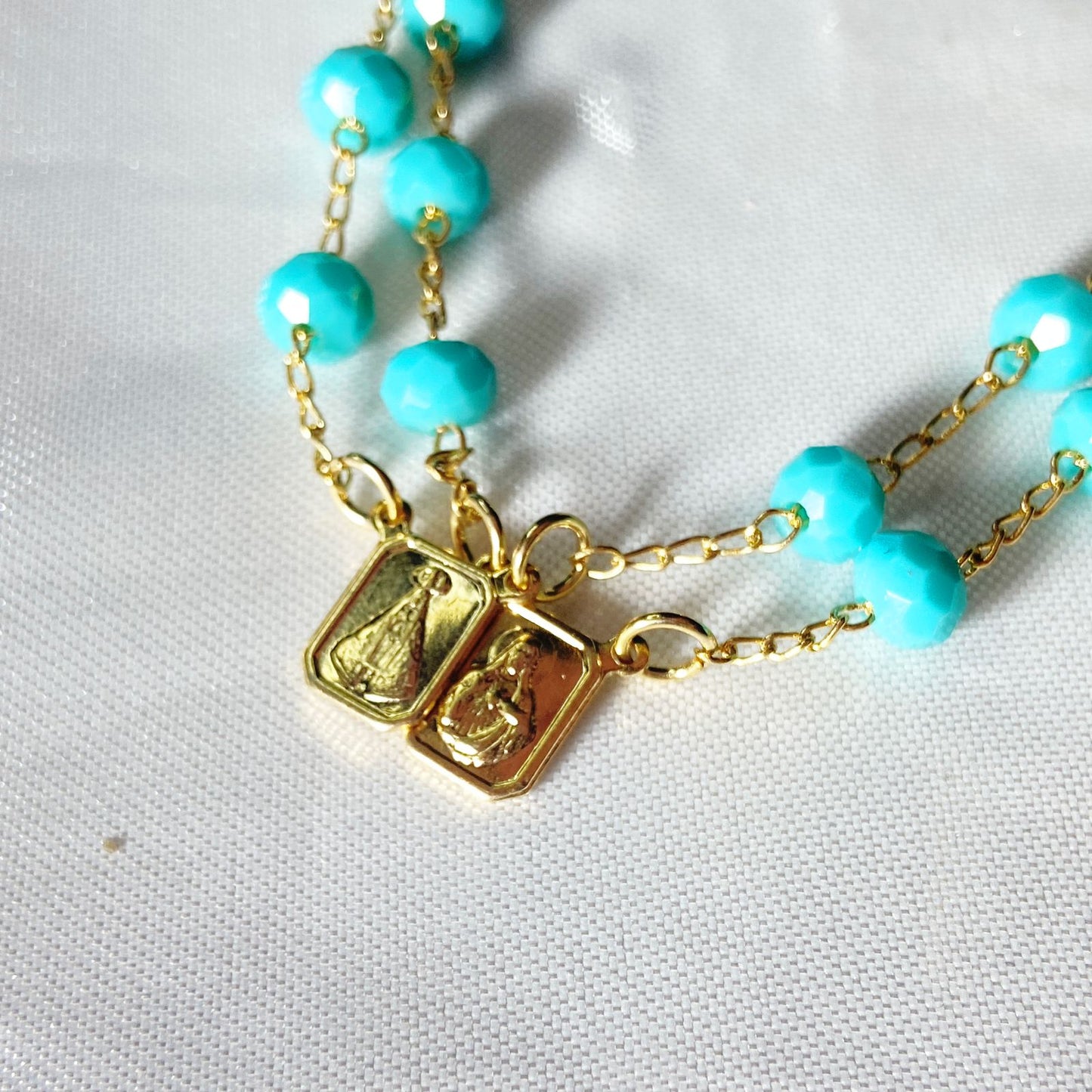 PULSEIRA ESCAPULARIO CRISTAL AZUL (3 UNIDADES)