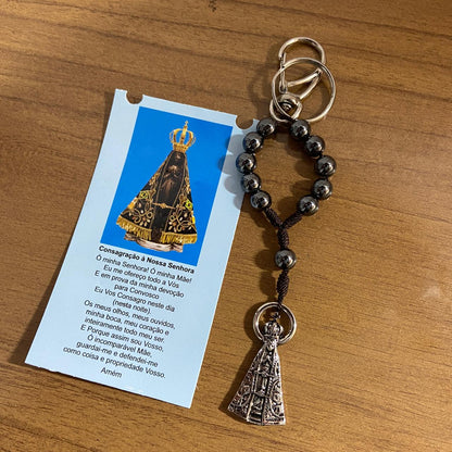 CHAVEIRO DEZENA HEMATITA COM MOSQUETE NOSSA SENHORA APARECIDA (3 UNIDADES)