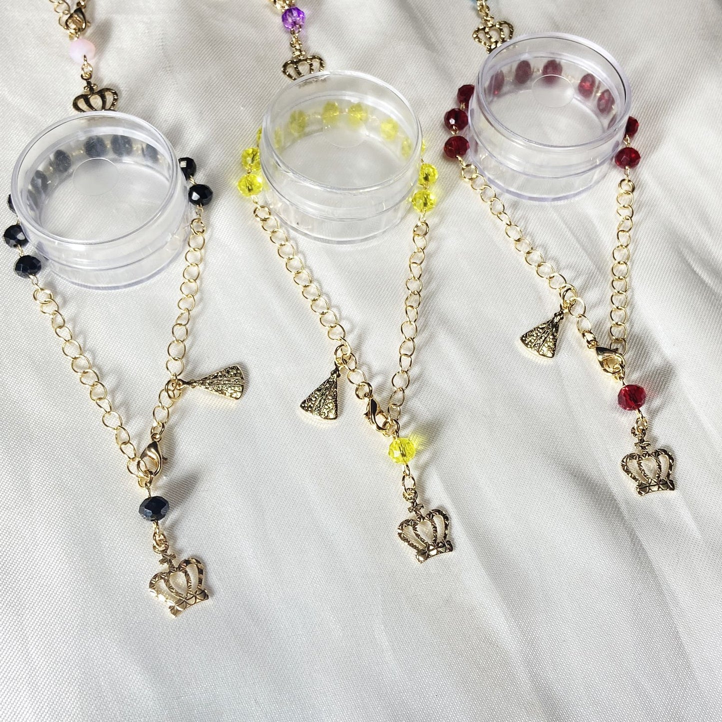 PULSEIRA DOURADA CRISTAL NOSSA SENHORA APARECIDA CORES SORTIDAS  (6 UNIDADES)