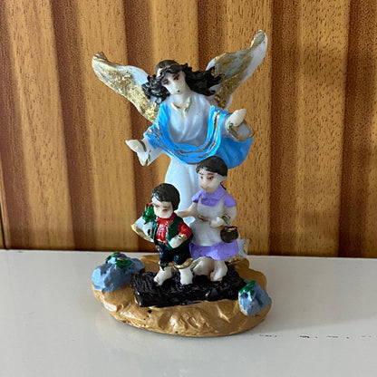 IMAGEM DE RESINA NACIONAL ANJO DA GUARDA AZUL COM CRIANÇA 08CM (1 UNIDADE)