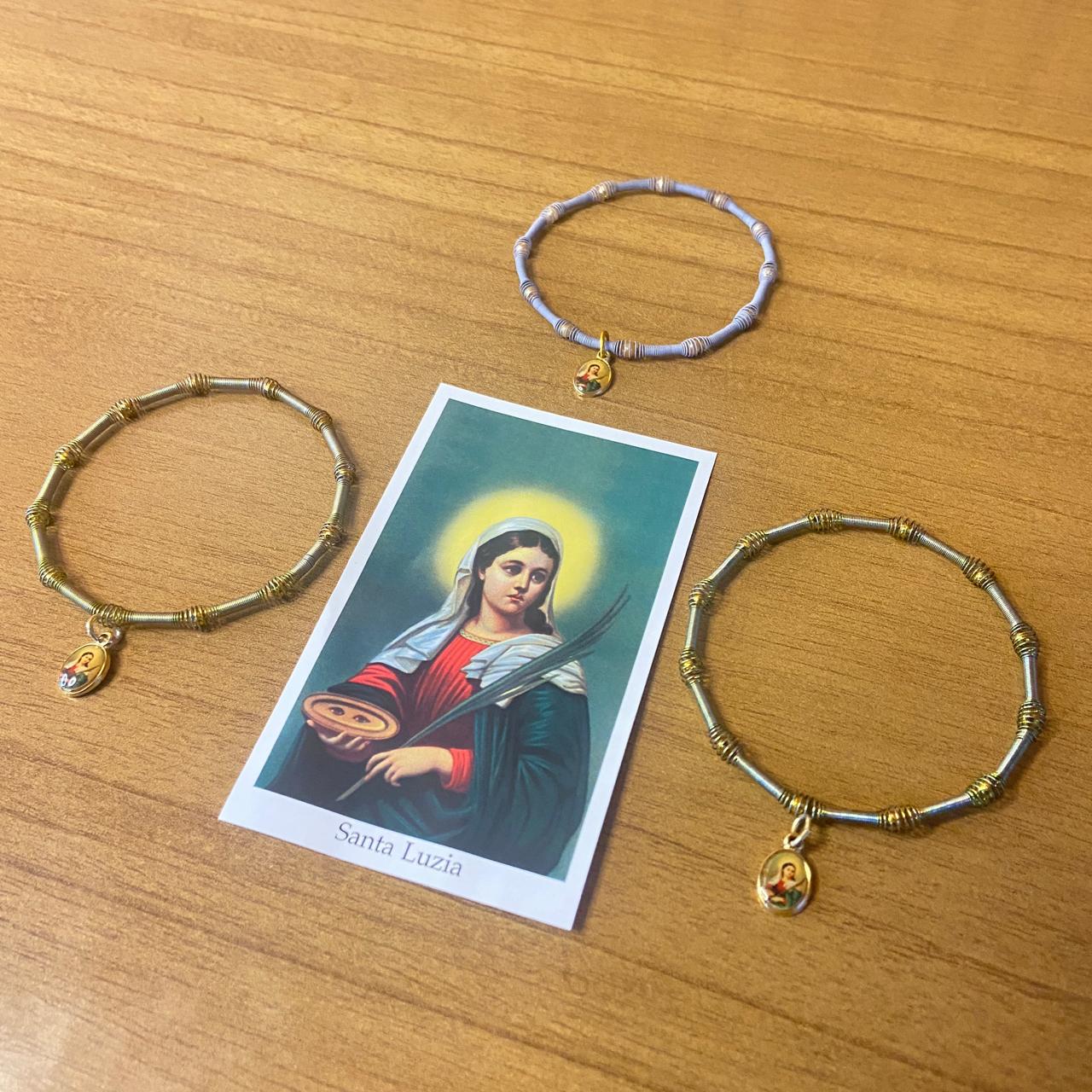 PULSEIRA DE MOLA COM MEDALHA SANTA LUZIA CORES SORTIDAS  (3 UNIDADES)