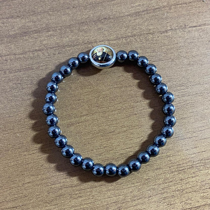 PULSEIRA HEMATITA MEDALHA RESINADA SÃO BENTO  ( 5 UNIDADES)