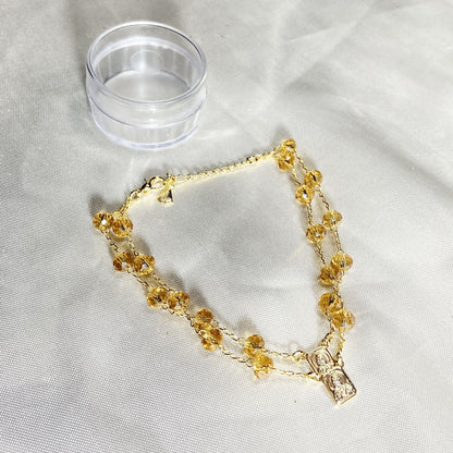 PULSEIRA ESCAPULARIO CRISTAL BEGE TRANSPARENTE (3 UNIDADES)