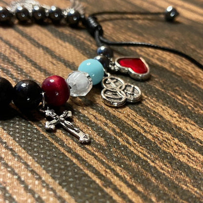 PULSEIRA HEMATITA COM PÉROLA A GRANDE HISTÓRIA DE JESUS REGULÁVEL   ( 1 UNIDADE)