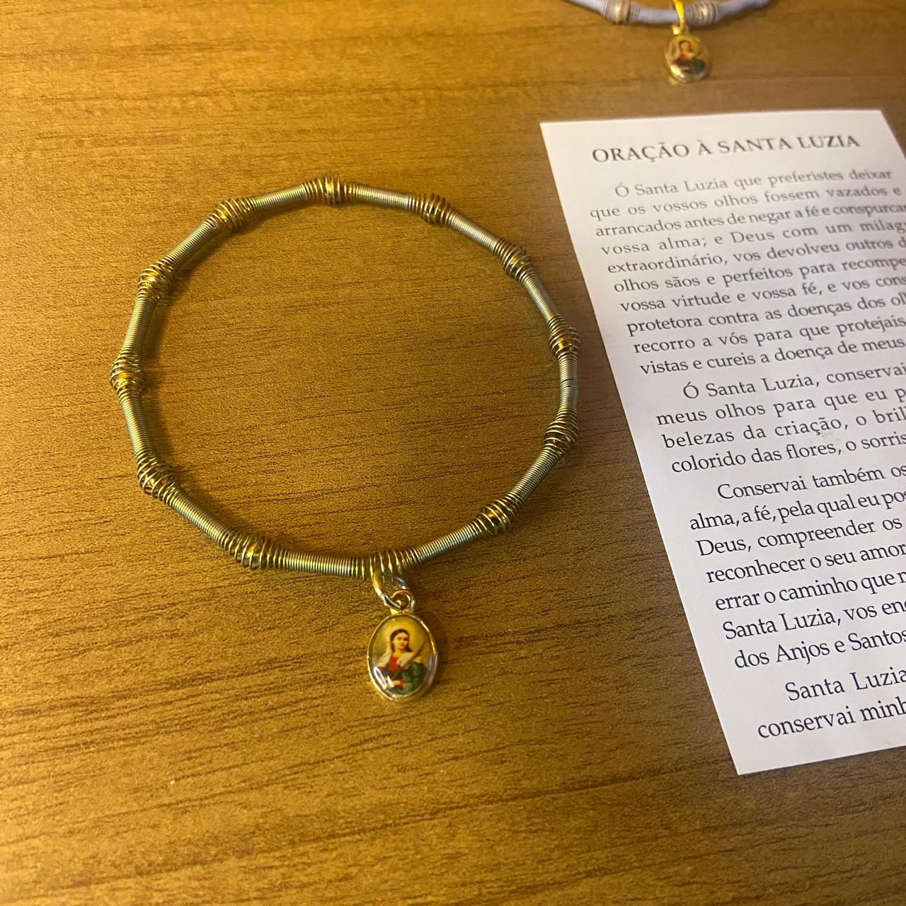 PULSEIRA DE MOLA COM MEDALHA SANTA LUZIA CORES SORTIDAS  (3 UNIDADES)