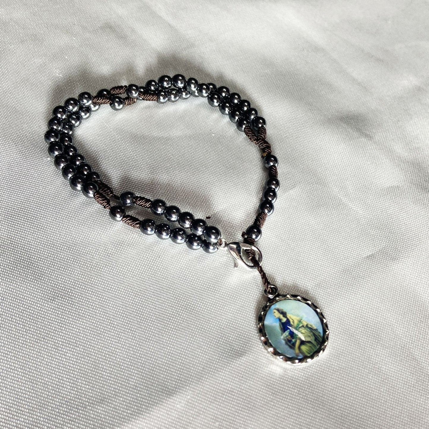 TERÇO PULSEIRA HEMATITA SANTA LUZIA 4MM (6 UNIDADES)