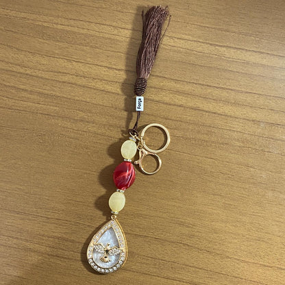 CHAVEIRO DE PEDRARIAS DIVINO ESPÍRITO SANTO GOTA COM STRASS (1 UNIDADE)