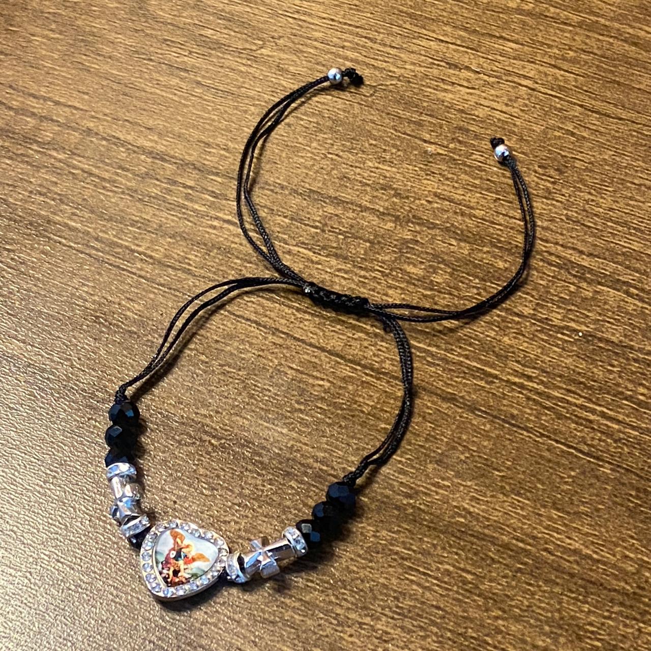 PULSEIRA REGULÁVEL CRISTAL PRETO COM MEDALHA RESINADA SÃO MIGUEL ARCANJO  ( 01 UNIDADE)