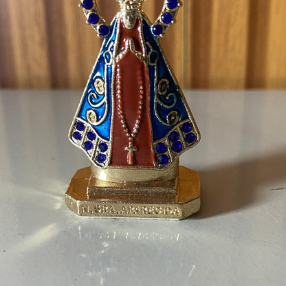 IMAGEM NOSSA SENHORA APARECIDA MARROM COM AURÉOLA  PARA CARRO STRASS AZUL (12 UNIDADES)
