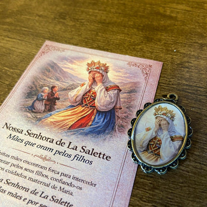 MEDALHA OURO VELHO RESINADA NOSSA SENHORA DE SALETTE (01 UNIDADE)