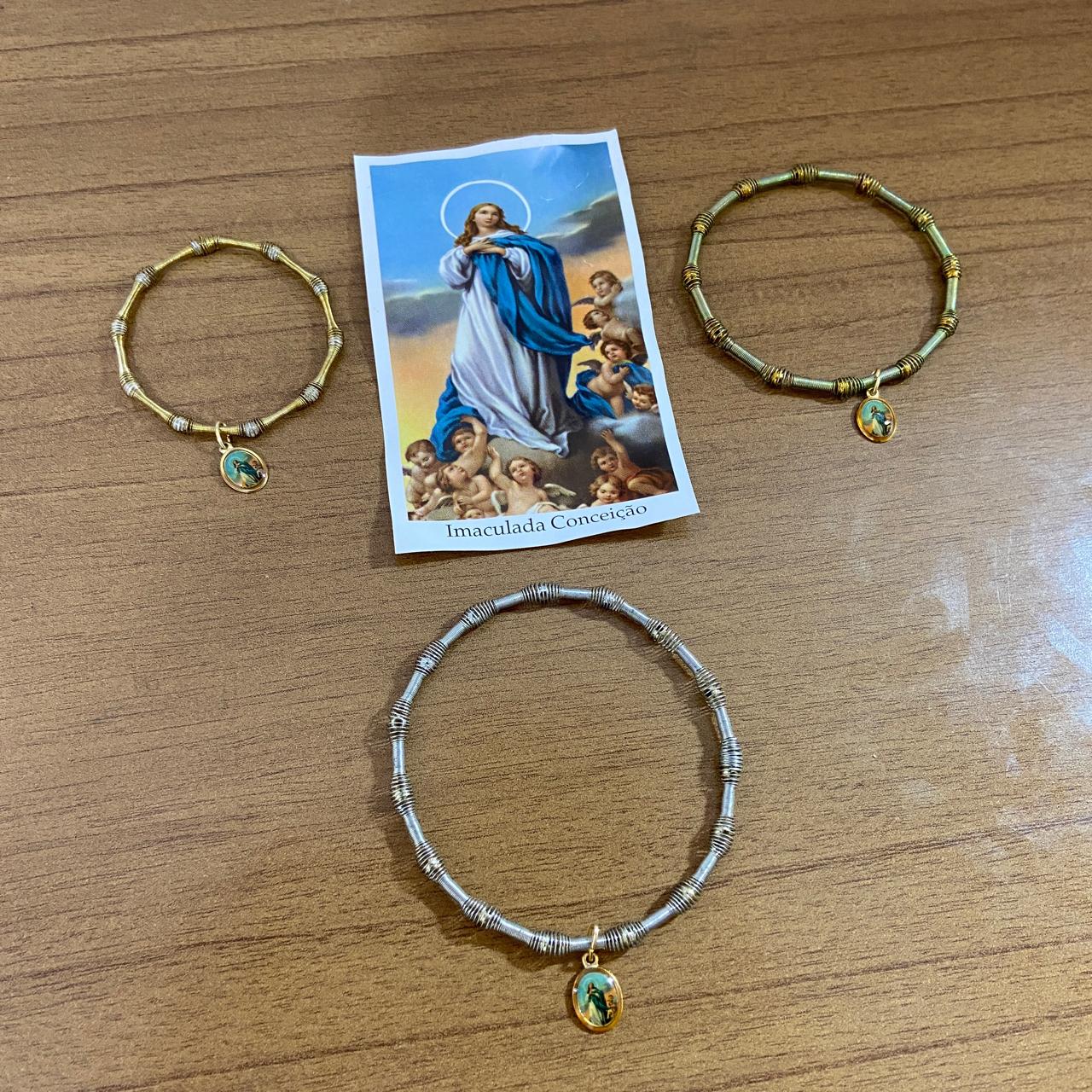 PULSEIRA DE MOLA COM MEDALHA NOSSA SENHORA DA IMACULADA CONCEIÇÃO CORES SORTIDAS  (3 UNIDADES)