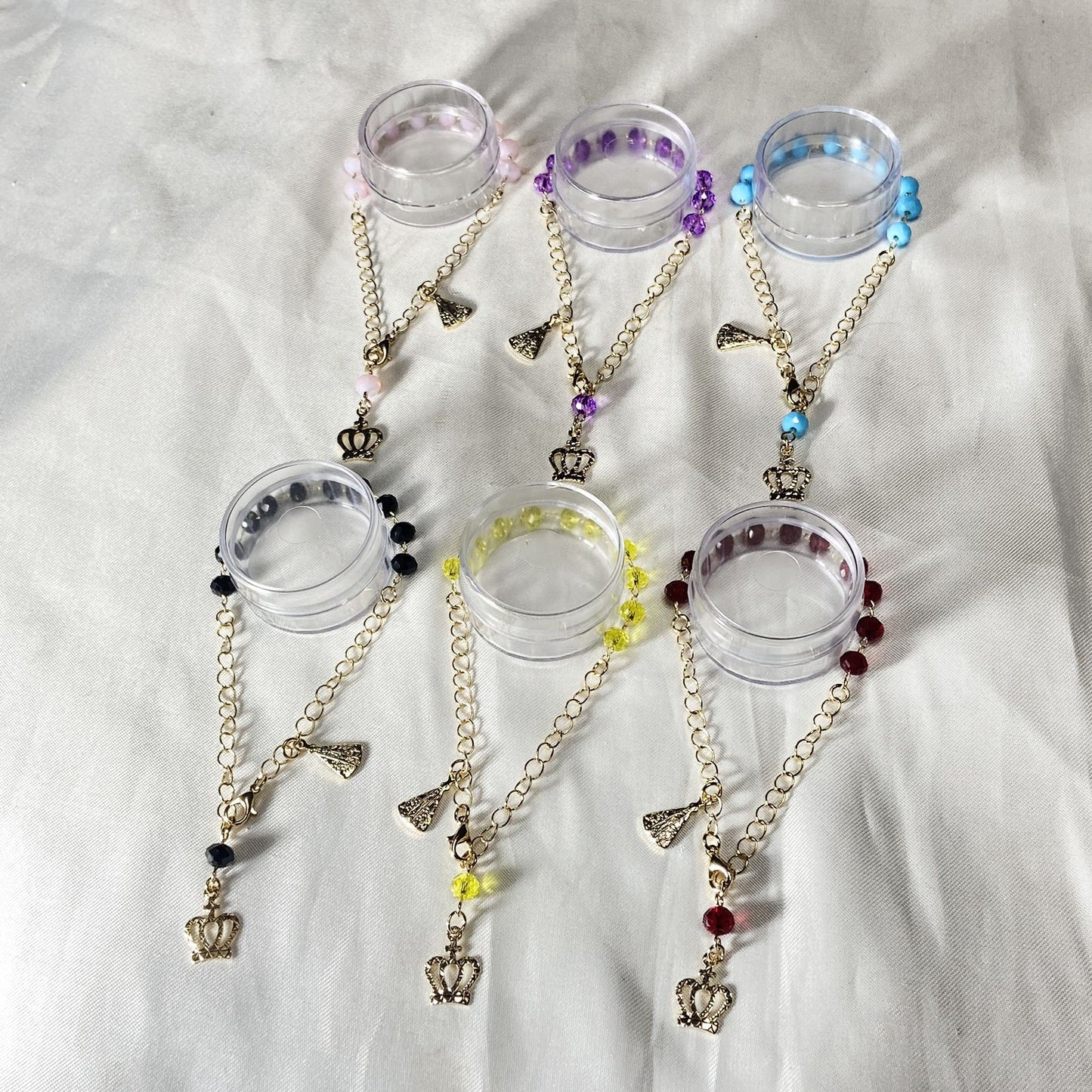 PULSEIRA DOURADA CRISTAL NOSSA SENHORA APARECIDA CORES SORTIDAS  (6 UNIDADES)