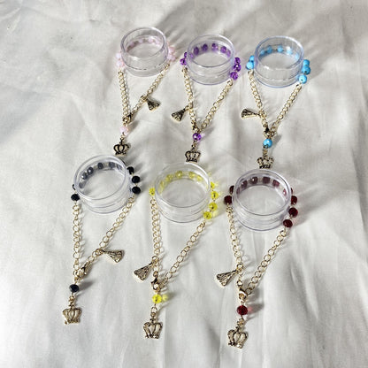 PULSEIRA DOURADA CRISTAL NOSSA SENHORA APARECIDA CORES SORTIDAS  (6 UNIDADES)