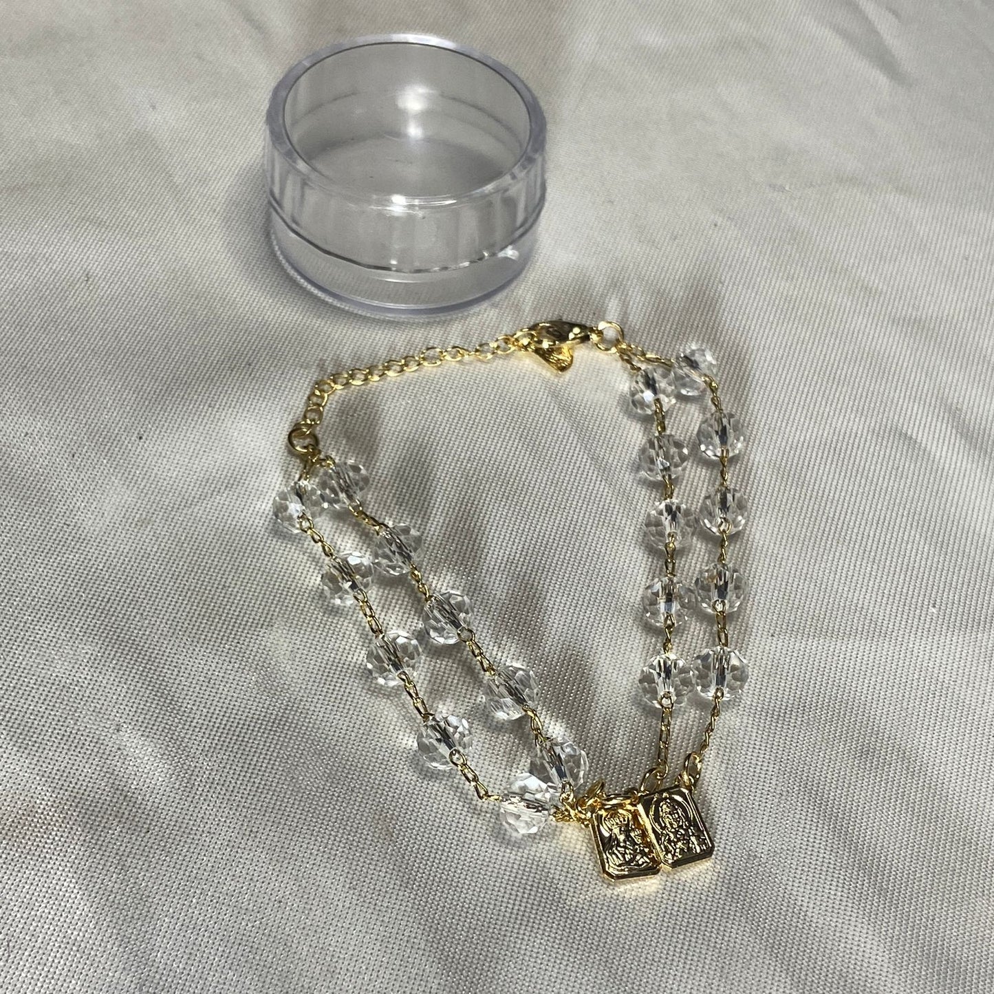 PULSEIRA ESCAPULARIO CRISTAL TRANSPARENTE (3 UNIDADES)