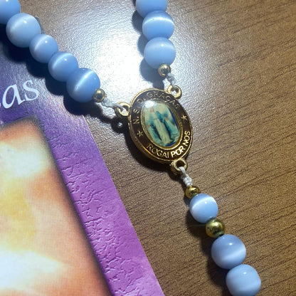 TERÇO PÉROLA AZUL NOSSA SENHORA DAS GRAÇAS 6MM (1 UNIDADE)