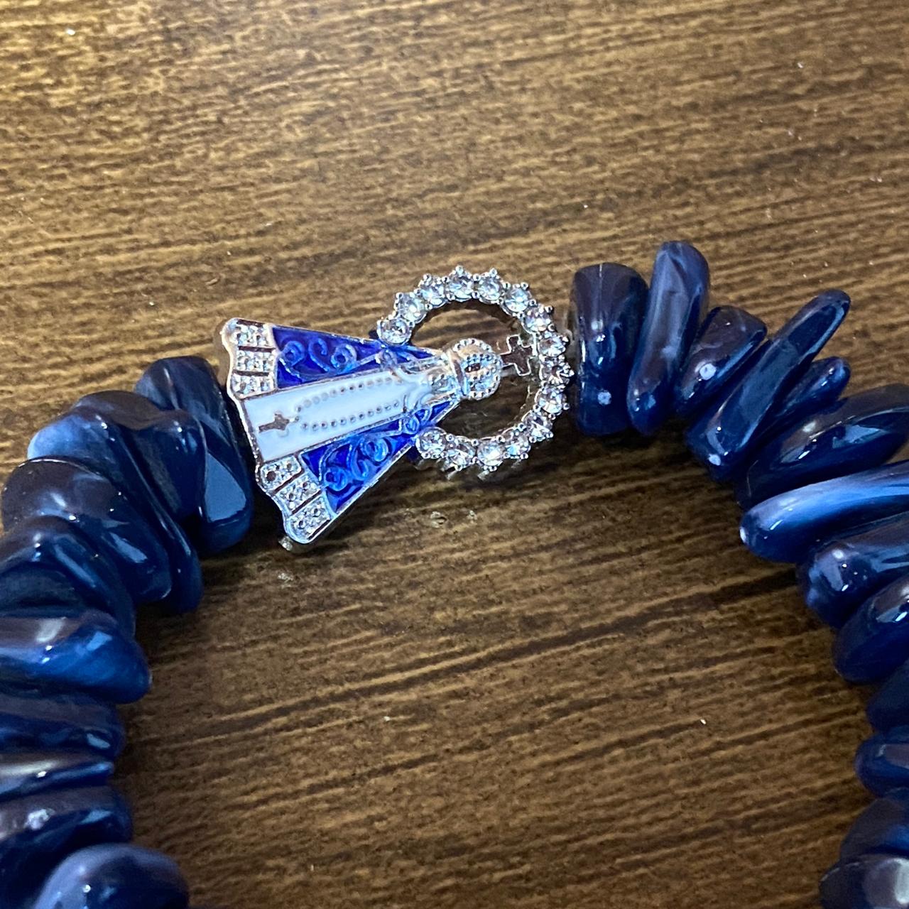 PULSEIRA PEDRARIAS COM PINGENTE NOSSA SENHORA APARECIDA COM STRASS MOD2 (03 UNIDADES)